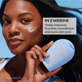 Shiseido Ultimate Sun Protector Lotion on the forearm, providing broad-spectrum protection for the body.