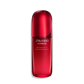 Shiseido Ultimune bottle close-up showing premium packaging and rapid absorption for radiant skin.