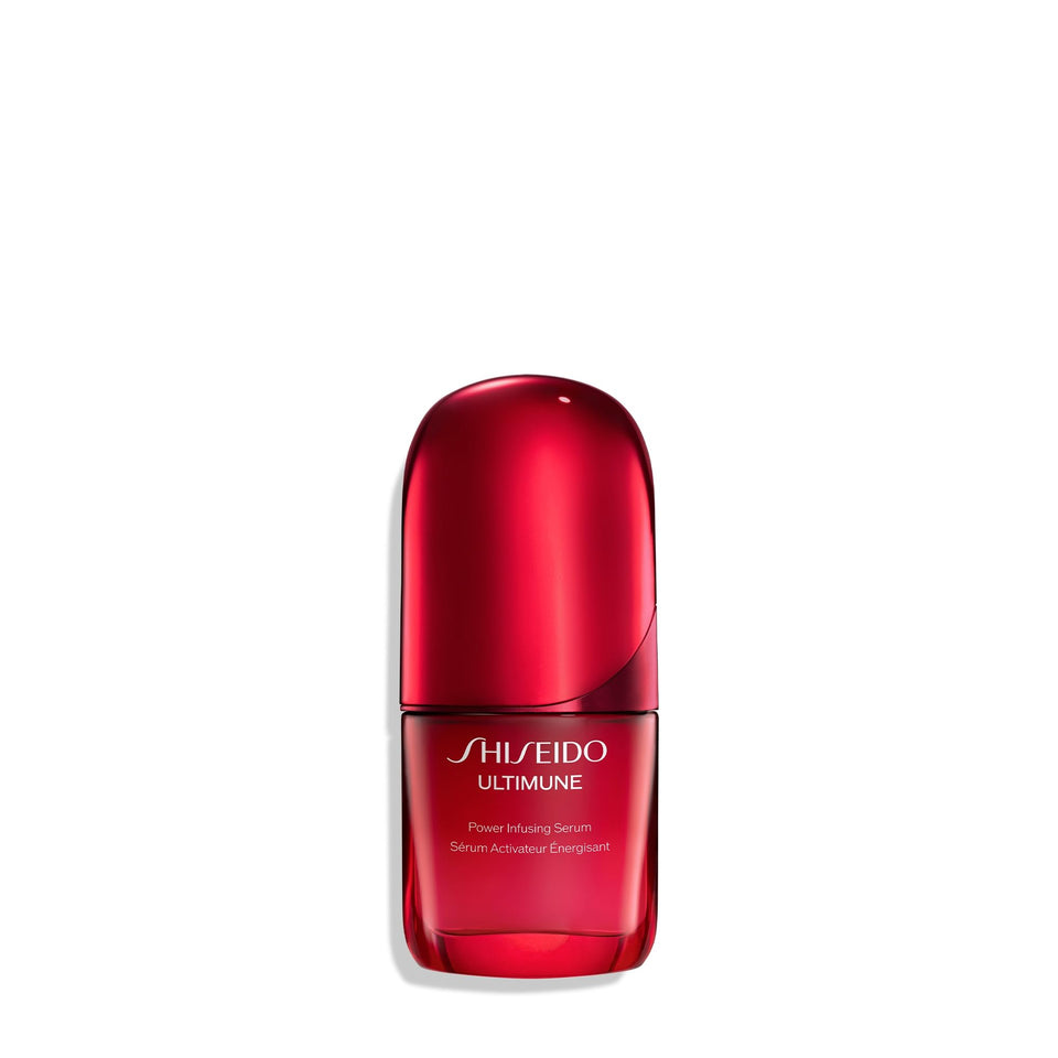 Shiseido Ultimune serum bottle close-up showing premium formula for radiant, youthful-looking skin.