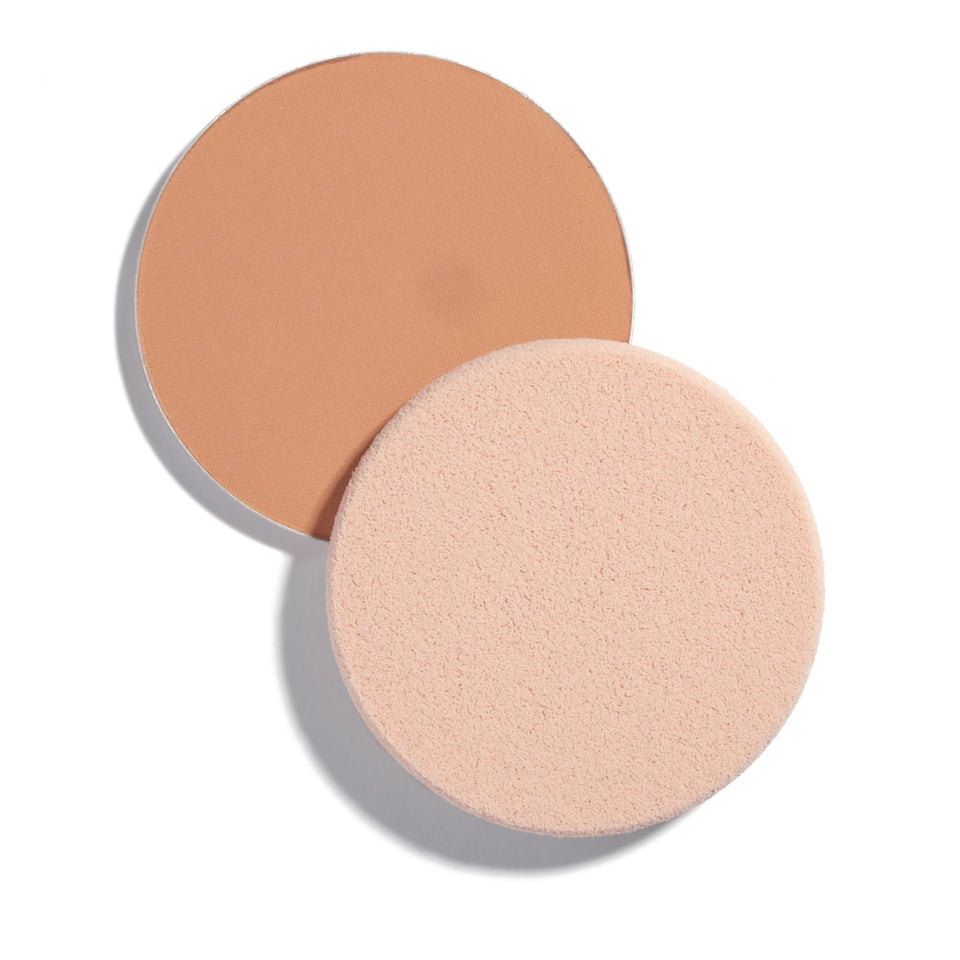 Shiseido UV Protective Compact Foundation Medium Ochre close-up showing powdery natural finish
