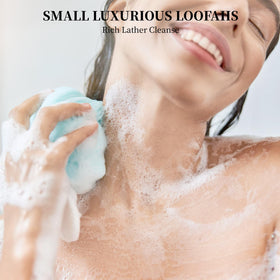 Showertime Mini Shower Loofah with hanging loop keeps it dry and ready for next use.
