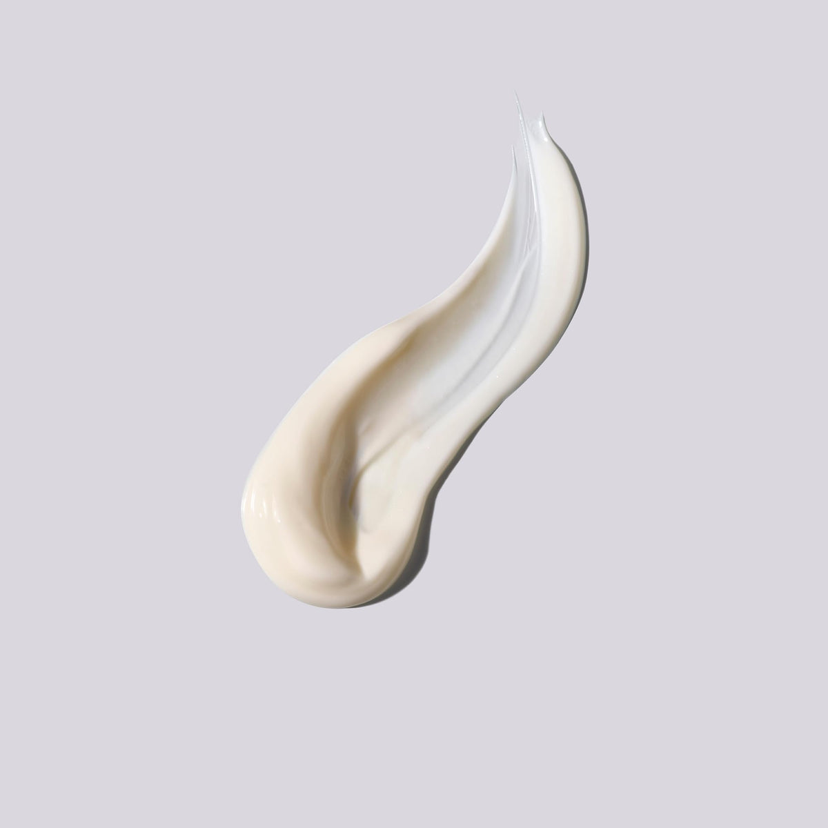 shu uemura art of hair Essence Absolue Nourishing Cream heat protection application close-up
