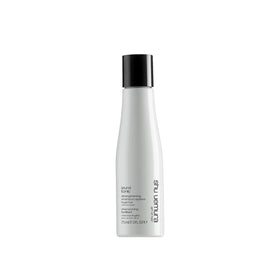 shu uemura art of hair Izumi Tonic shampoo bottle highlights hydration and strengthening.