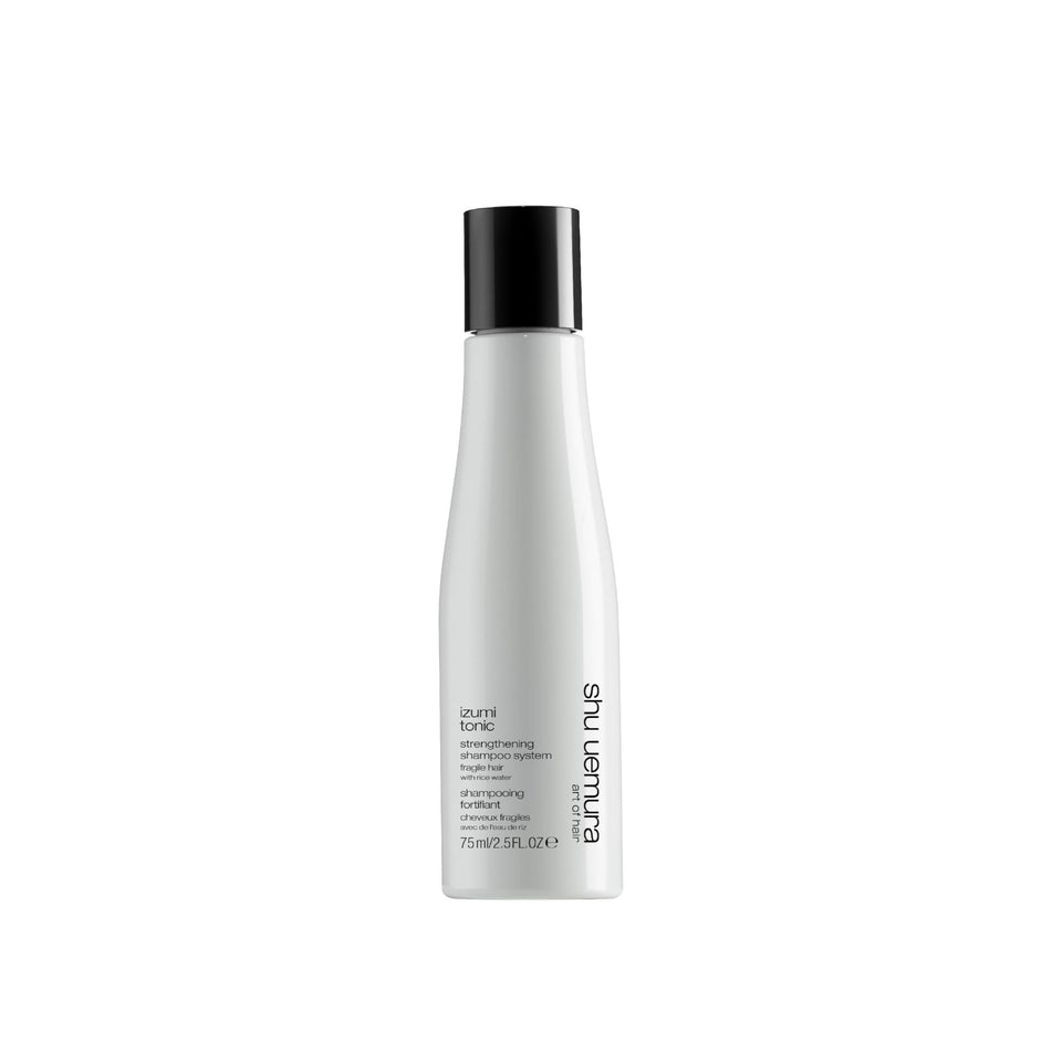 shu uemura art of hair Izumi Tonic shampoo bottle highlights hydration and strengthening.