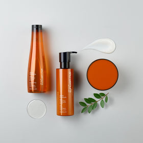 shu uemura art of hair Urban Moisture application on damp hair for even distribution.