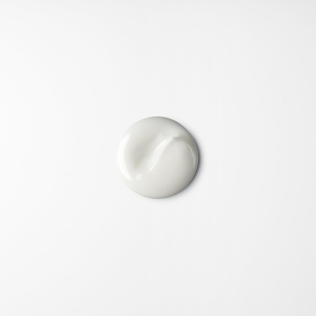 shu uemura art of hair Uzu Cotton Definition Cream packaging highlights creamy texture for styling