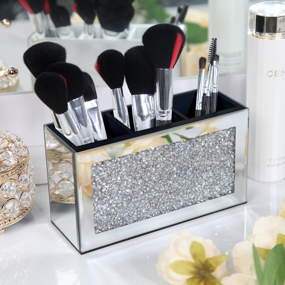 Shyfoy mirrored makeup brush holder with crystal center keeps brushes neatly displayed on vanity.