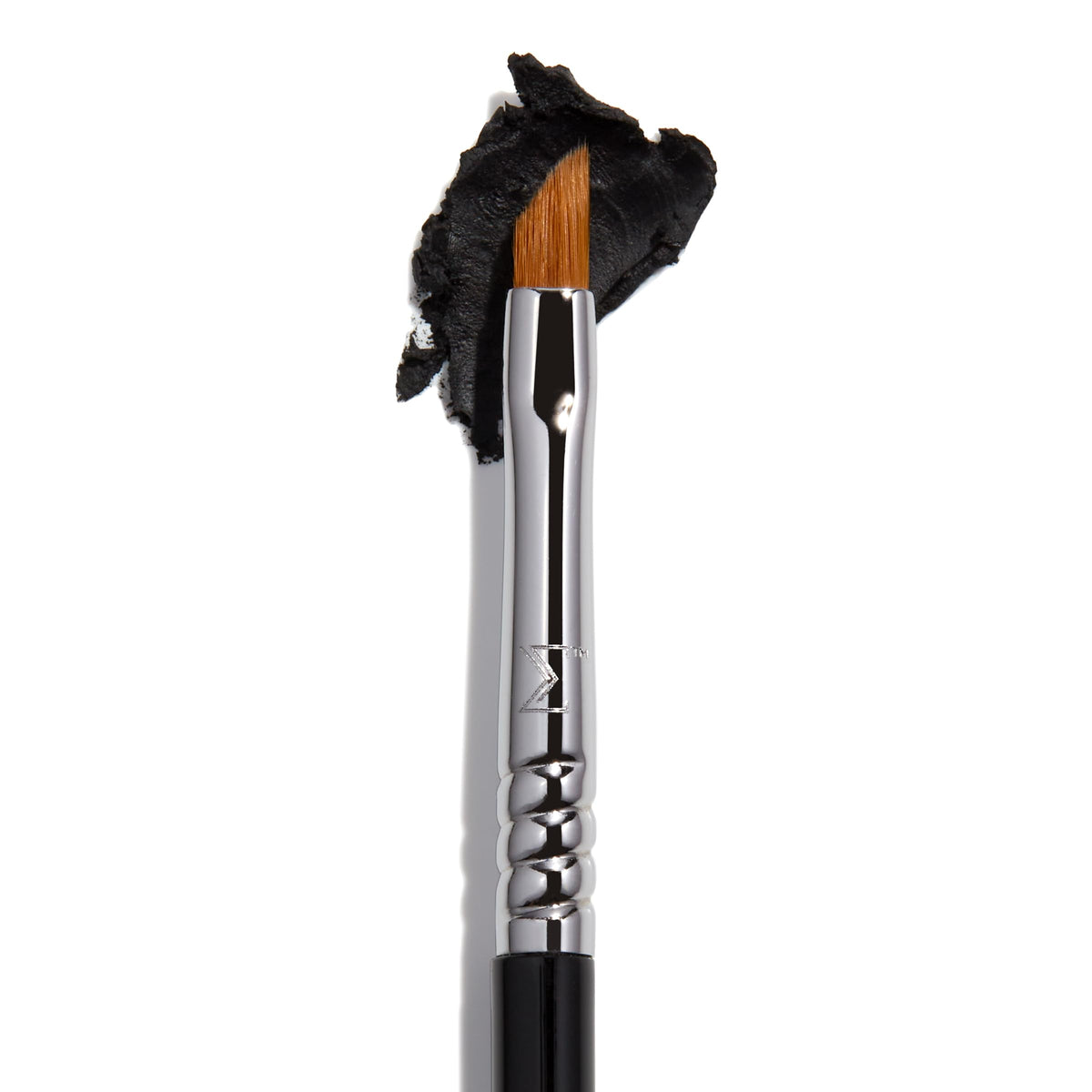 Sigma Beauty E06 Winged Liner brush in hand shaping a cat eye.