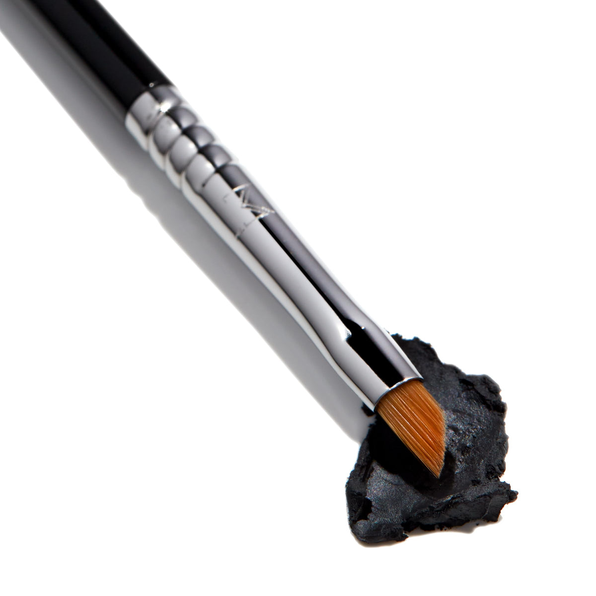 Sigma Beauty E06 Winged Liner brush stroke demonstrates sleek eyeliner application.