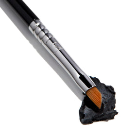 Sigma Beauty E06 Winged Liner brush stroke demonstrates sleek eyeliner application.