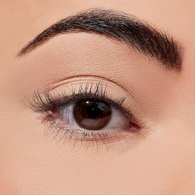 Sigma Beauty Ignite primer packaging shows sleek design and compact application.