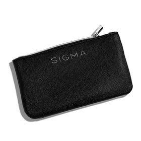 Sigma Beauty Glam N Glow pouch with brushes inside a compact bag