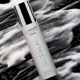 Sigma Beauty Sigmagic Foam applied to sponge to demonstrate cleansing action