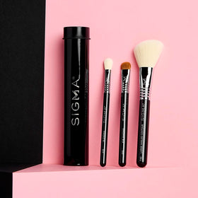 Sigma Beauty Travel Essential Trio packaging highlighting vegan, skin-safe brushes for travel use.