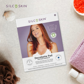 Silc Skin Decollette Pad on skin for overnight smoother chest texture.