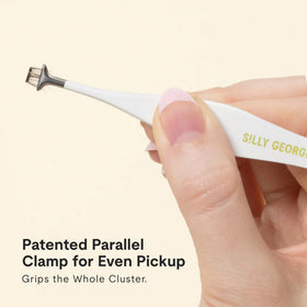 Silly George Hammerhead tweezer shows full cluster grip with parallel clamp.