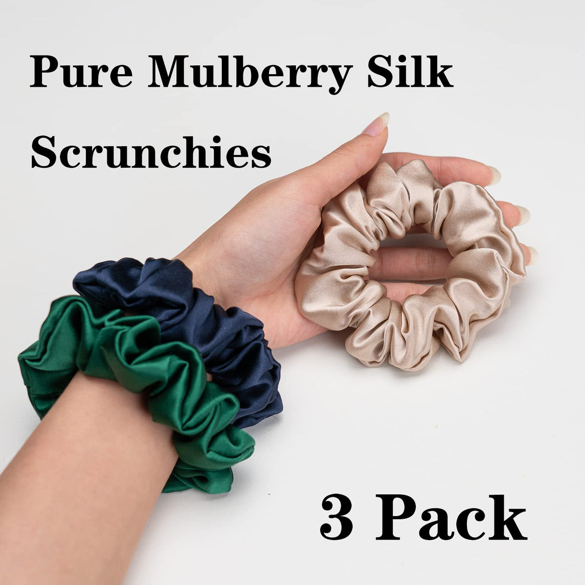 Silmer silk scrunchie emerald close-up highlights lustrous fabric reducing friction on hair