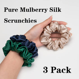 Silmer silk scrunchie emerald close-up highlights lustrous fabric reducing friction on hair