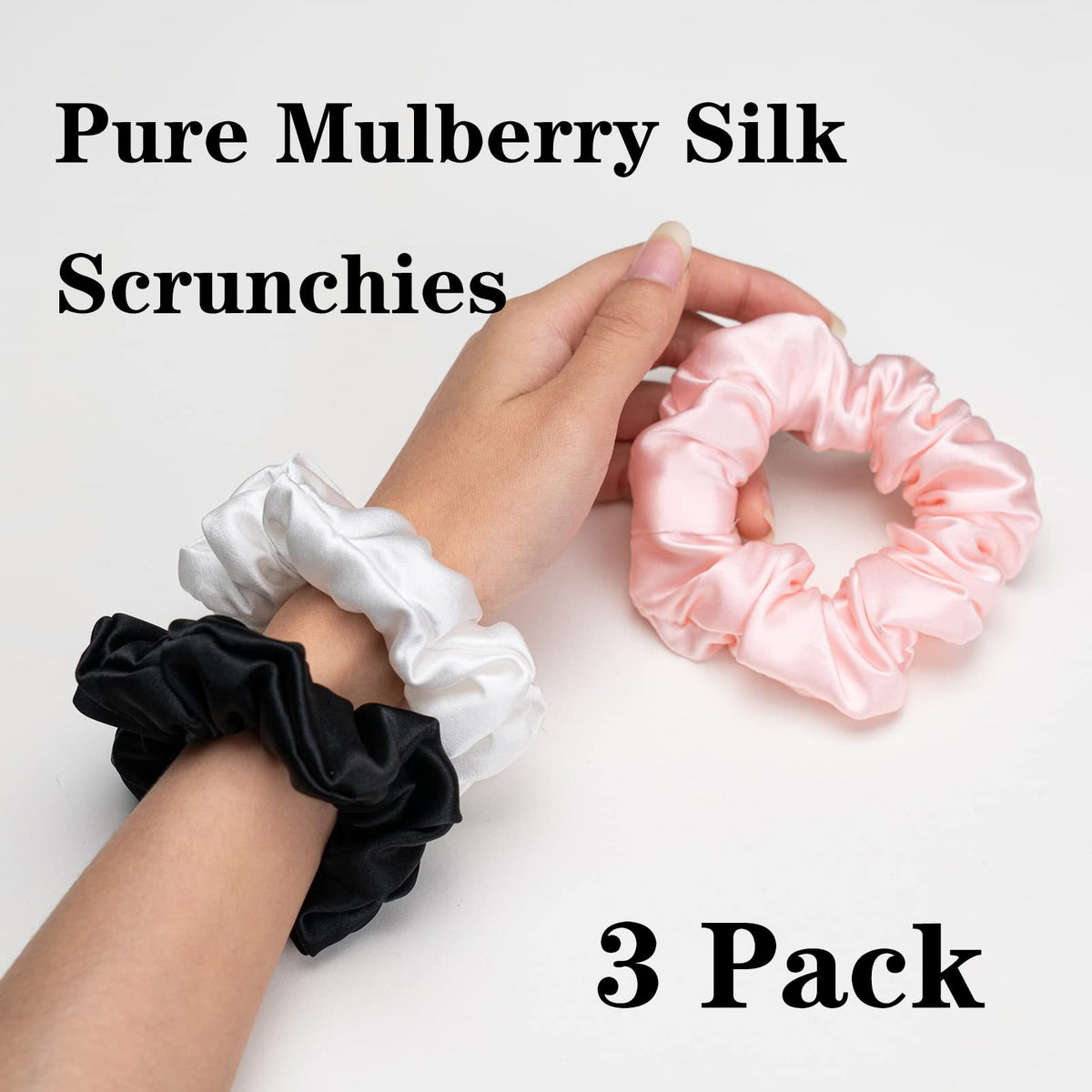 Silmer Silk Scrunchie white around bun, secure hold with minimal friction