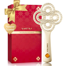 SIMETRA detangler brush with crystal inlay eases tangles for all hair types.