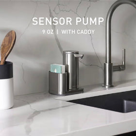 simplehuman caddy stores sponge beside the pump for a tidy sink