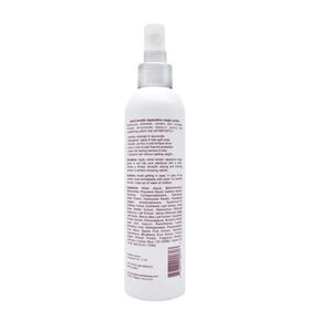 SIMPLY SMOOTH Magic Potion Original spray application highlights heat protection and frizz control in a quick mist.