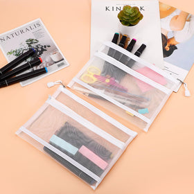 Colorful Sinzip mesh pouches help color-code items during travel.