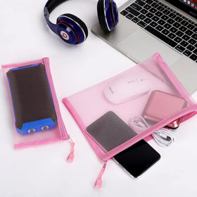 Sinzip mesh pouch used to organize office supplies and stationery.