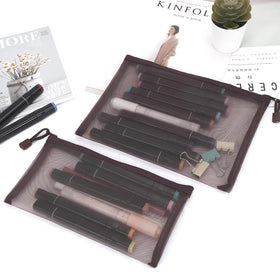 Sinzip travel organizer mesh pouch keeps toiletries and cables tidy.