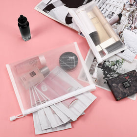 Sinzip travel essentials pouch for toiletries and small gadgets in one lightweight bag.