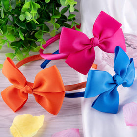 SIQUK bow headband for girls, perfect for daily wear and events.