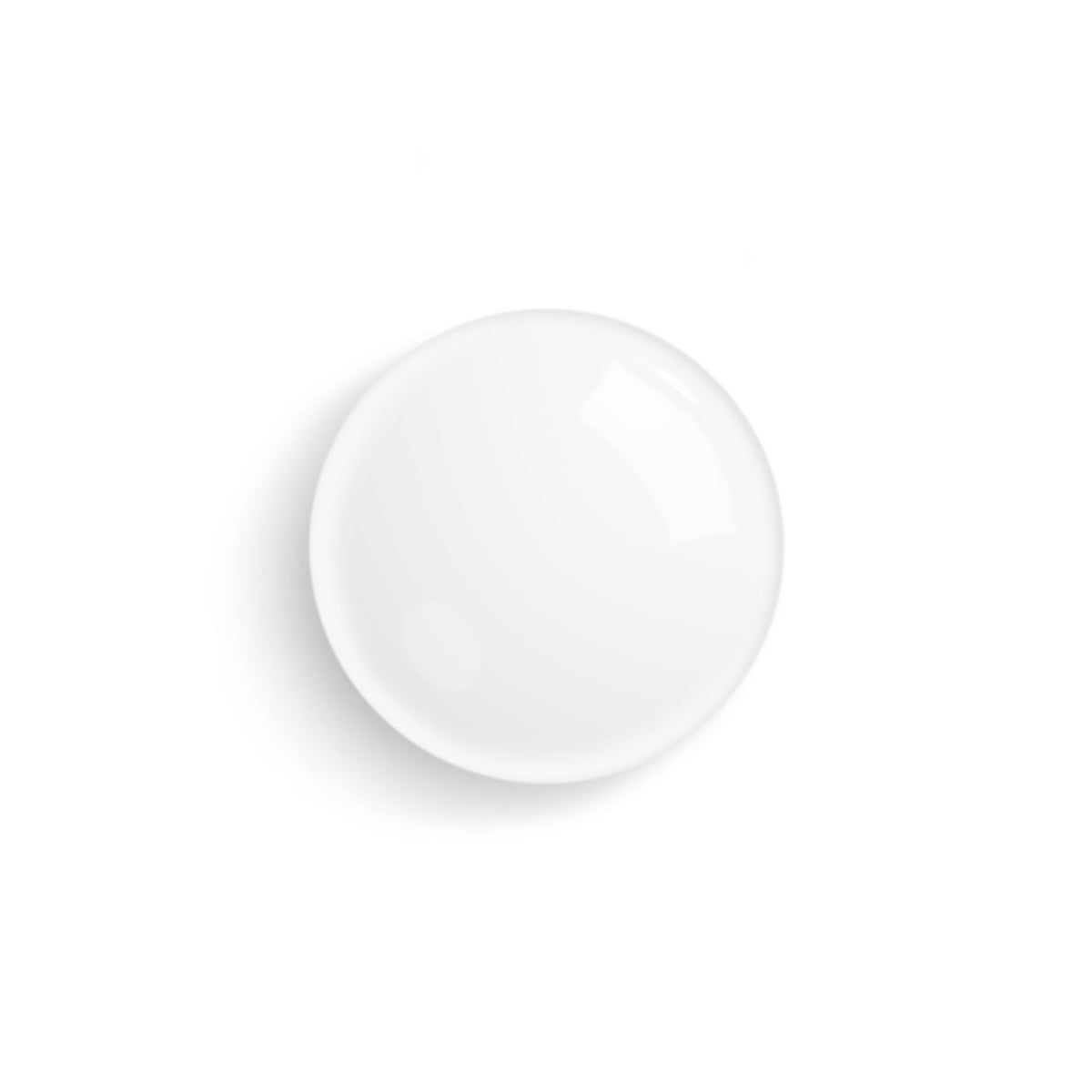Close-up of application with a cotton pad for prepping skin with the Floral Toning Lotion.
