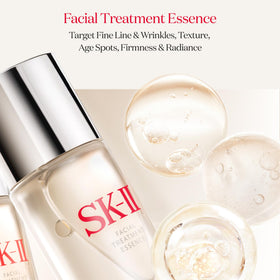 SK-II Glow Up Duo mask close-up on skin implies hydration and brightness after wear