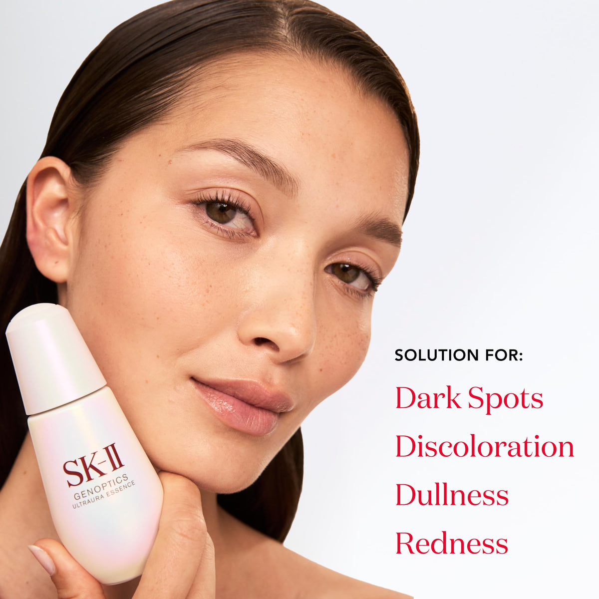 GenOptics Essence texture close-up shows silky, brightening serum finish.