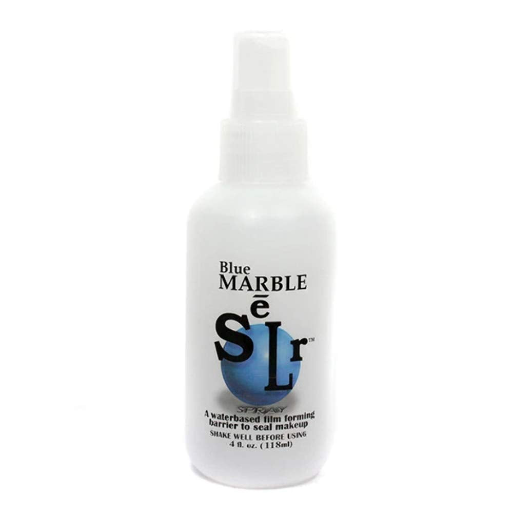 Skin Illustrator Blue Marble bottle pour demonstrates quick sealing for stage makeup durability.