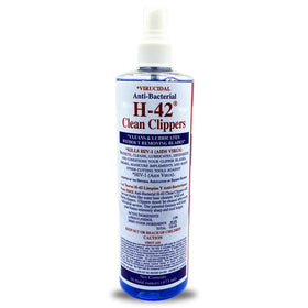 Skin Revolution H-42 Clipper Cleaner spray bottle in use, waterless protection reduces rust risk.