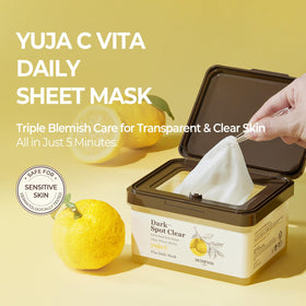SKINFOOD Yuja C Vita Daily Sheet Mask on face ready for 5-minute brightening.