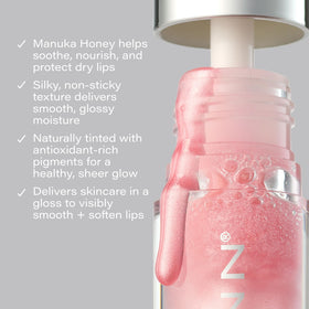 Application on lips showing smooth, non-sticky glide of SKINN Luminous Blush Lip Oil.