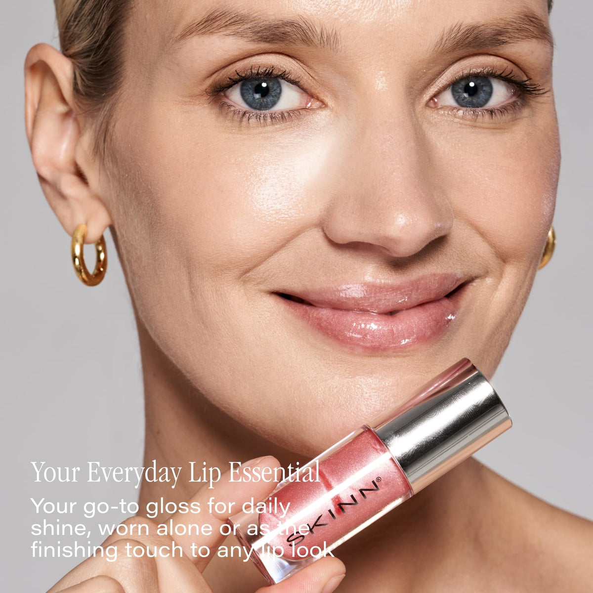 SKINN Luminous Lip Oil Manuka honey closeup emphasizes nourishment and moisture sealing.
