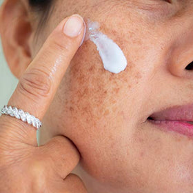 Texture swatch on skin shows lightweight Skinuva Brite cream.