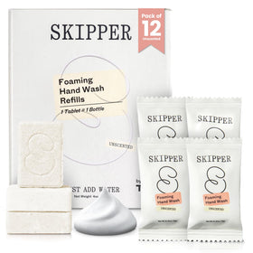 Skipper tablet refills dropped into water to create foaming hand soap.