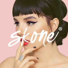 Skone Plum Black shade delivering rich color in a single swipe