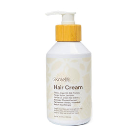 Sky and Sol Leave-In Conditioner bottle close-up for deep moisture and shine.
