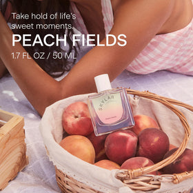 Skylar Peach Fields cap closeup emphasizes premium packaging and clean beauty values