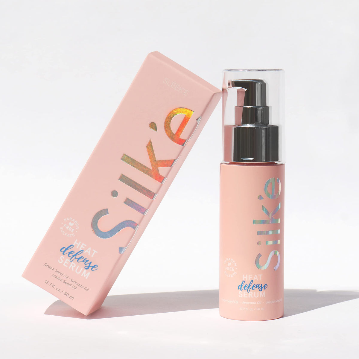 Sleek'e Silk'e serum taming frizz for a sleek style close-up