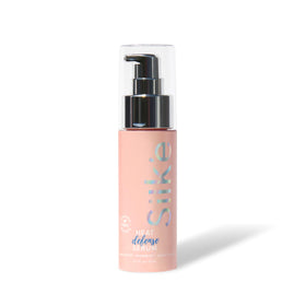 Sleek'e Silk'e Heat Defense Serum bottle protecting hair during heat styling