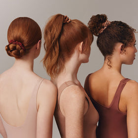 Slip Silk Skinny Scrunchies copper bun styling close-up