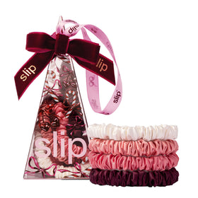 SLIP Skinny Scrunchies in crimson with candy cane ornament packaging for gentle all-day wear