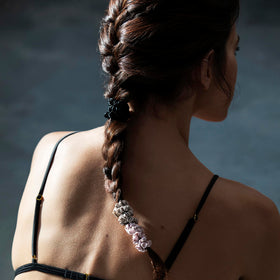 SLIP pink closeup highlights lustrous Mulberry silk texture that feels soft on hair.