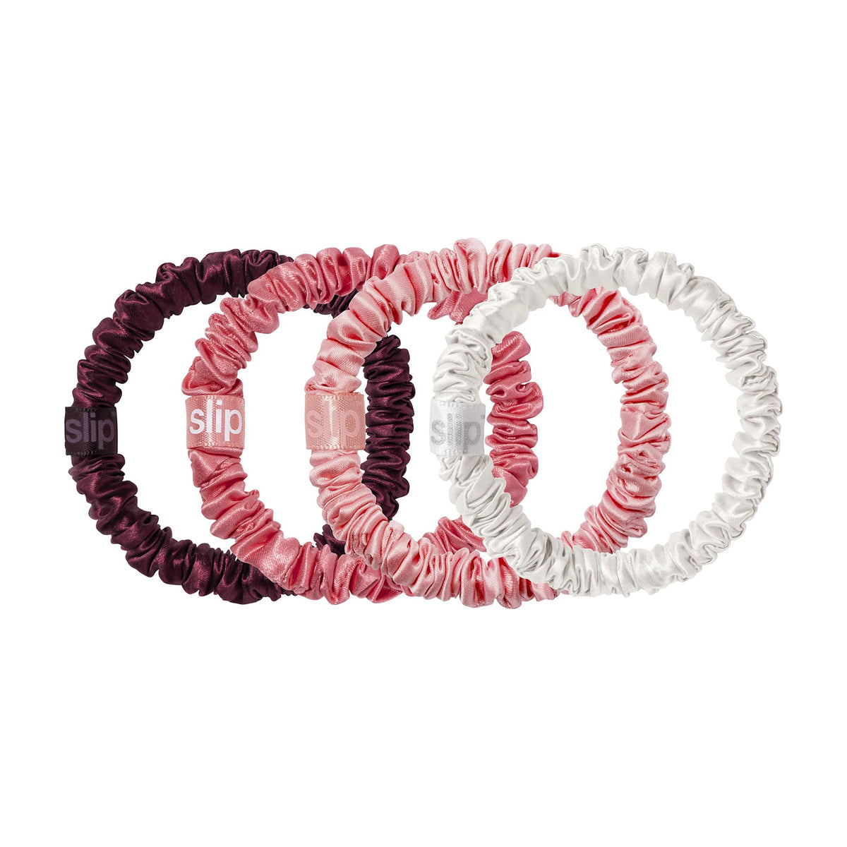 Close-up of candy cane ornament packaging for SLIP Skinny Scrunchies